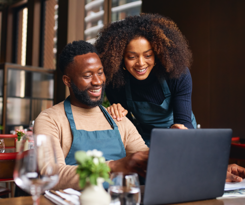 Photo of dad and kid on tablet
