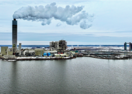 image of a power plant located near a body of water